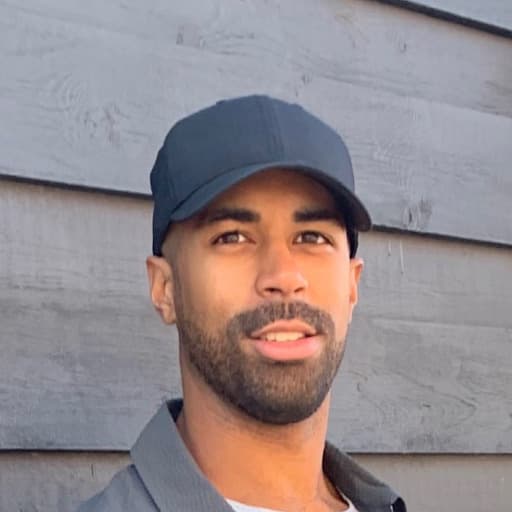 A headshot of Tristan Deane